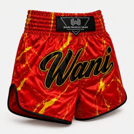 Red and gold fire marble Muay Thai boxing shorts with Wani logo, satin fabric, front view