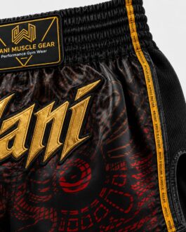 Custom Wani Muscle Gear boxing shorts waistband with gold embroidered logo and mesh side panel