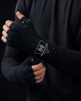 Boxer wrapping hands with Wani Muscle Gear custom hand wraps before training session