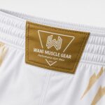 Wani Muscle Gear gold waistband label on custom boxing shorts
