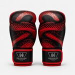 Pair of black and red PU leather boxing gloves facing forward on white background