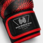 Close-up of Wani Muscle Gear boxing glove wrist strap and logo patch