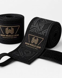 Wani Muscle Gear black and gold boxing hand wraps, one rolled and one unrolled showing thumb loop and hook-and-loop closure