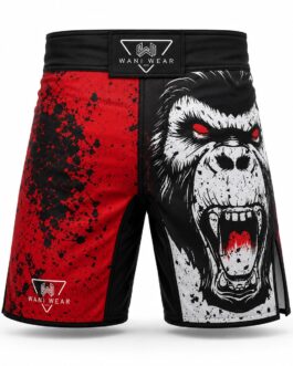 Home Custom sublimated MMA fight shorts front view with wide elastic waistband, reinforced stitching, and side slit mobility panels by Wani Wear