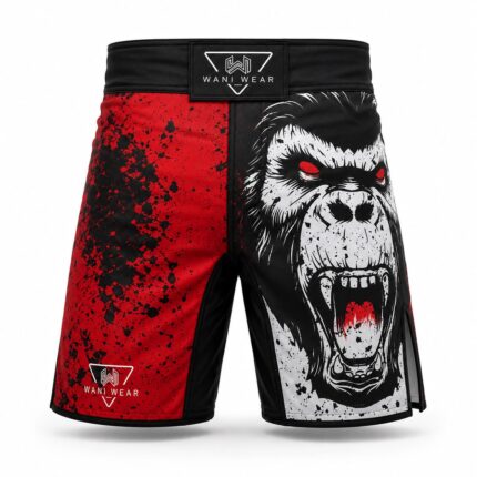 Home Custom sublimated MMA fight shorts front view with wide elastic waistband, reinforced stitching, and side slit mobility panels by Wani Wear