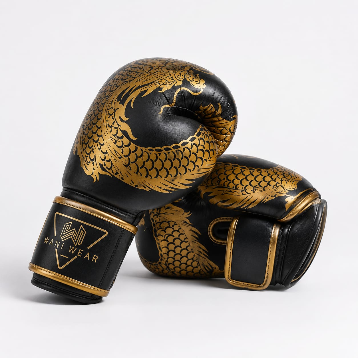 Wani Wear – Dragon Series Competition Boxing Gloves Custom Wani Wear boxing gloves dragon design close-up — synthetic leather texture, gold trim stitching, wrist logo detail