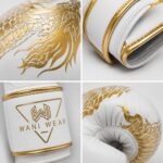 Custom white gold boxing gloves close-up — gold foil dragon texture and stitching detail