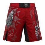 Sak Yant praying hands MMA fight shorts, angled side view, red sublimated fabric