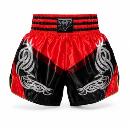 Home Close-up of Muay Thai shorts embroidery, stitching and waistband detail - Wani Wear manufacturer
